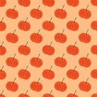Seamless geometric pattern with orange pumpkin on light pink background. Vector print for fabric background