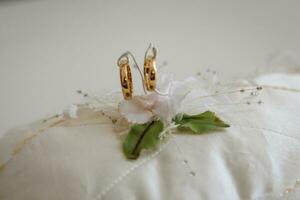 Detail of two golden wedding rings photo