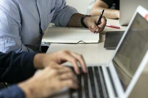 Detail of workers at the office. Business details photo