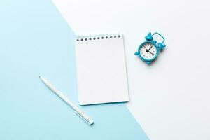 Blank notebook with pen on white background. Back to school and education concept photo