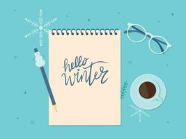 Notepad with pen and handwritten text Winter. Vector winter background with snowflakes