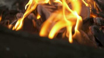 Flaming charcoal on the grill. Camera clouseup, Slow motion video