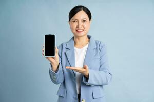 Portrait of a businesswoman using a smart phone photo