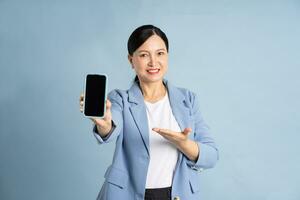 Portrait of a businesswoman using a smart phone photo