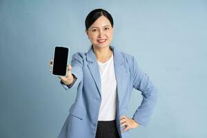 Portrait of a businesswoman using a smart phone photo