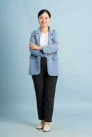 full body photo of a middle-aged businesswoman