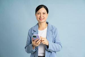 Portrait of a businesswoman using a smart phone photo