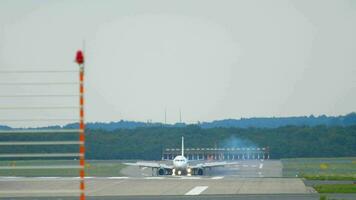 Airplane braking after landing in Dusseldorf Airport video
