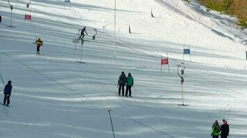 BELOKURIKHA, RUSSIAN FEDERATION FEBRUARY 22, 2017 - Unidentified tourists relax at the mountains ski resort Belokurikha video