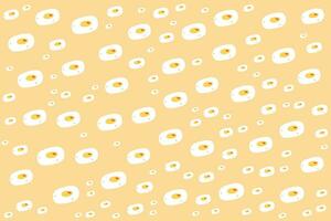 a yellow background with white eggs on it vector