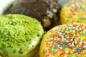 Colorful donuts is placed organizedly, after some edits. photo