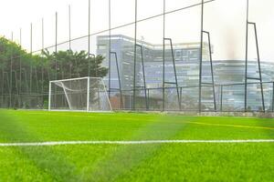 A soccer field view from outside the fence, focusing on the field, after some edits. photo