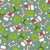 Seamless vector Christmas pattern with sugar cane, envelope, gift box and Christmas sock. In a hand-drawn style on a green background. Stock illustration