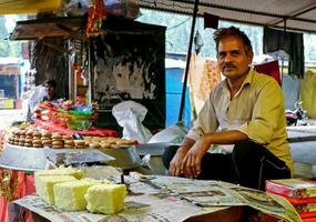 A Vendor sale famous pera and barfi indian sweets at Main Bazaar Road photo