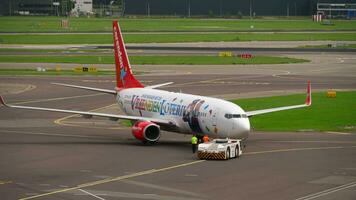 AMSTERDAM, THE NETHERLANDS JULY 29, 2017 - Corendon Dutch Airlines Boeing 737 PH CDF towing before departure to Hurghada. Shiphol Airport, Amsterdam, Holland video