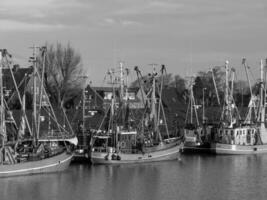 greetsiel at the north sea in germany photo