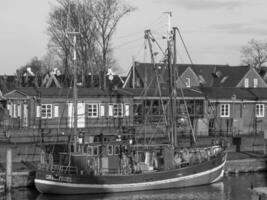 greetsiel at the north sea in germany photo