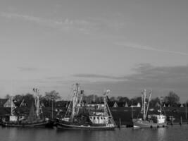 greetsiel at the north sea in germany photo