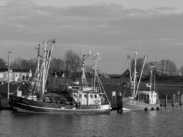 greetsiel at the north sea in germany photo