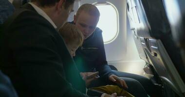 Parents and little son traveling by air video