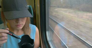 Young Woman Taking A Photo On Train video