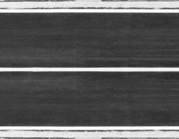 asphalt road with marking lines White stripes traffic on the road surface black texture Background. photo