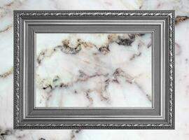 Gray frame Vintage photo frame on marble stone wall background