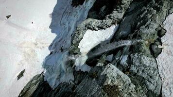 Waterfall with ice, flying up video