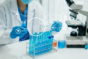 DNA molecule testing concepts. The doctor in a mask examines DNA molecules on the chemical laboratory with virtual icon photo