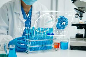 DNA molecule testing concepts. The doctor in a mask examines DNA molecules on the chemical laboratory with virtual icon photo