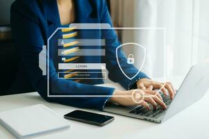 Cyber security concept, Login, User, identification information security and encryption, secure access to user's personal information woman using smart phone and tablet in office photo