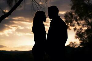 Evening skys backdrop frames serene couples touching silhouette scene AI Generated photo