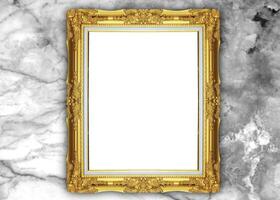 Golden picture frame isolated on marble background photo