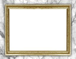 Golden picture frame isolated on marble background photo