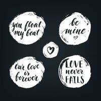 Set of round textured badges with modern calligraphy love quotes on the blackboard. photo