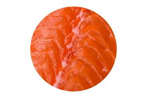 Fresh raw salmon red fish fillet with salt and spices photo