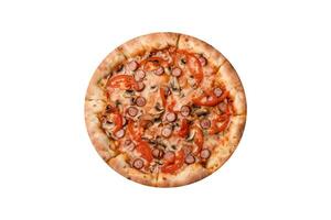 Bavarian pizza with smoked sausages, tomatoes, cheese, salt and spices photo