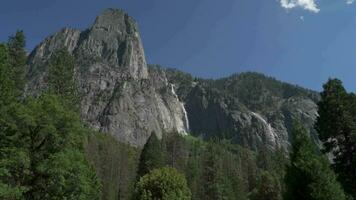 Sentinel Falls a long series of cascades descending into Yosemite Valley alongside Sentinel Rock video