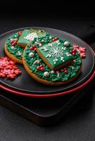 A beautiful Christmas composition consisting of ceramic plates, gingerbread and other elements photo