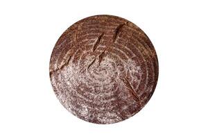 delicioso Fresco marrón un pan con sal, semillas y granos en un blanco antecedentes foto