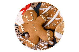 Christmas homemade gingerbread cookies on dark concrete table photo