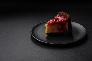 Delicious sweet cheesecake cake with mascarpone cheese, cherry berries and jam photo