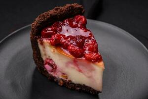 Delicious sweet cheesecake cake with mascarpone cheese, cherry berries and jam photo