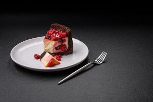 Delicious sweet cheesecake cake with mascarpone cheese, cherry berries and jam photo
