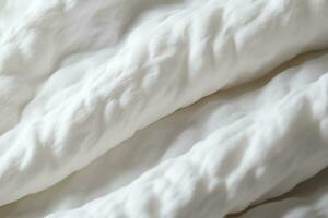 Close up photography capturing the subtle thread count in cotton textures photo