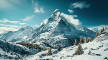 Majestic mountain peak covered in snow photo