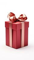 Red gift box with a ribbon and bow photo