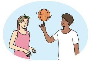 Happy multiethnic couple play basketball photo