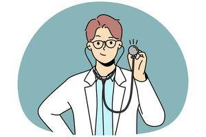 Smiling male doctor with stethoscope photo