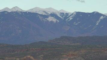 Arches National Park Arch Rock Beautiful Rock Formation with Mountain on The Background Moab UTAH video